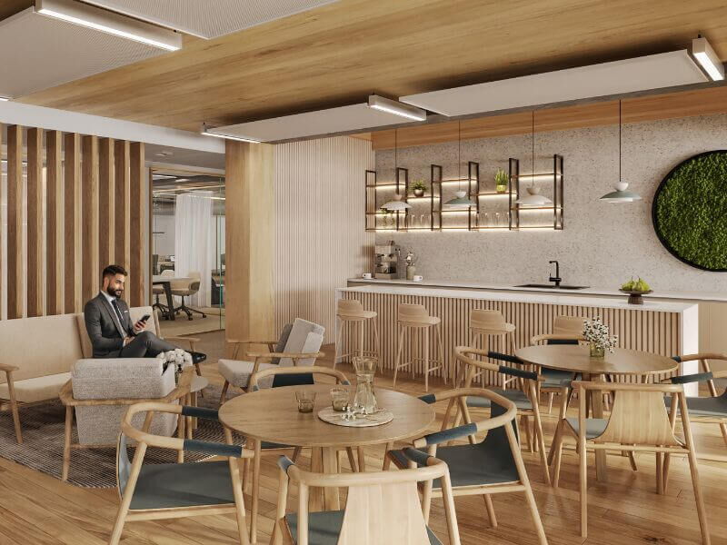 Zeitgenössisches Bürointerieur mit Holzverkleidung, bequemen Sitzgelegenheiten und einer Teeküche im Leopoldsquartier