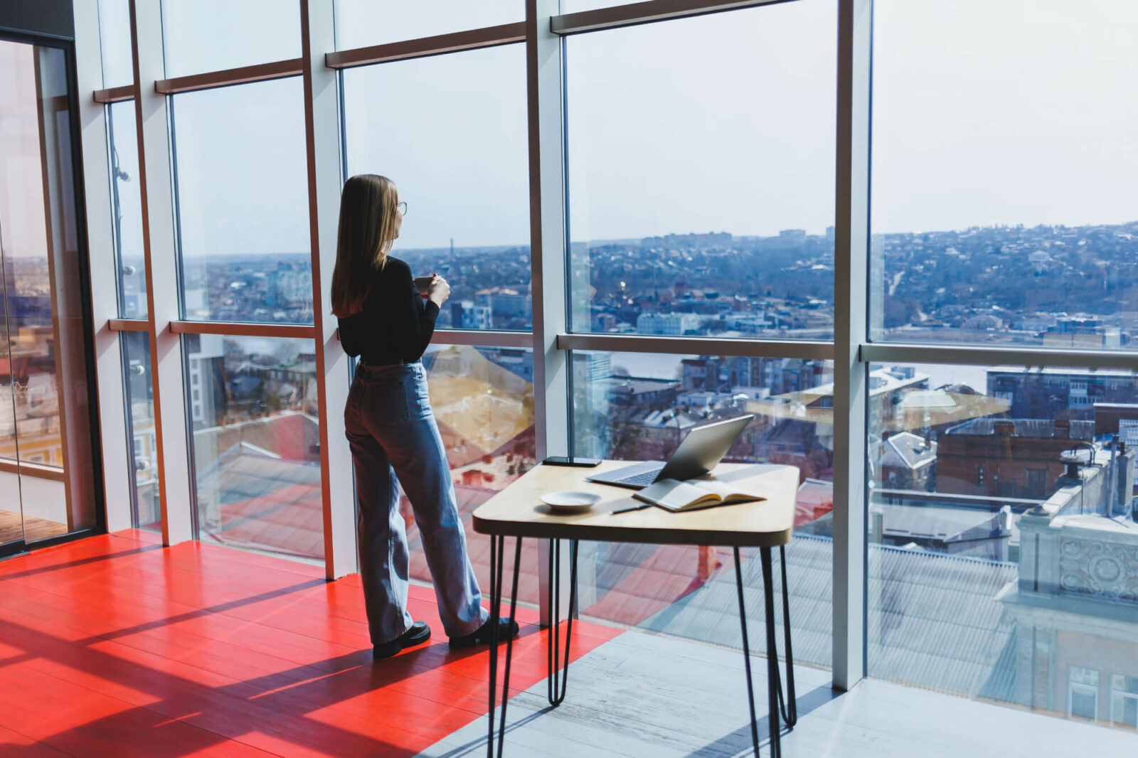 european-woman-drinks-coffee-looks-out-window-cafe-young-smiling-girl-glasses-stands-near-window-recreation-leisure-free-time-modern-female-lifestyle